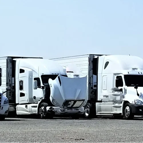 big-rigs-all-in-a-row-truck-stop-2026-03-20-03-05-57-utc